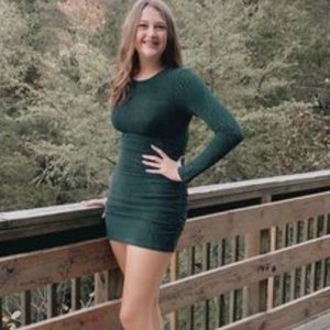 Short modest formal dress.  Dark green with sparkles